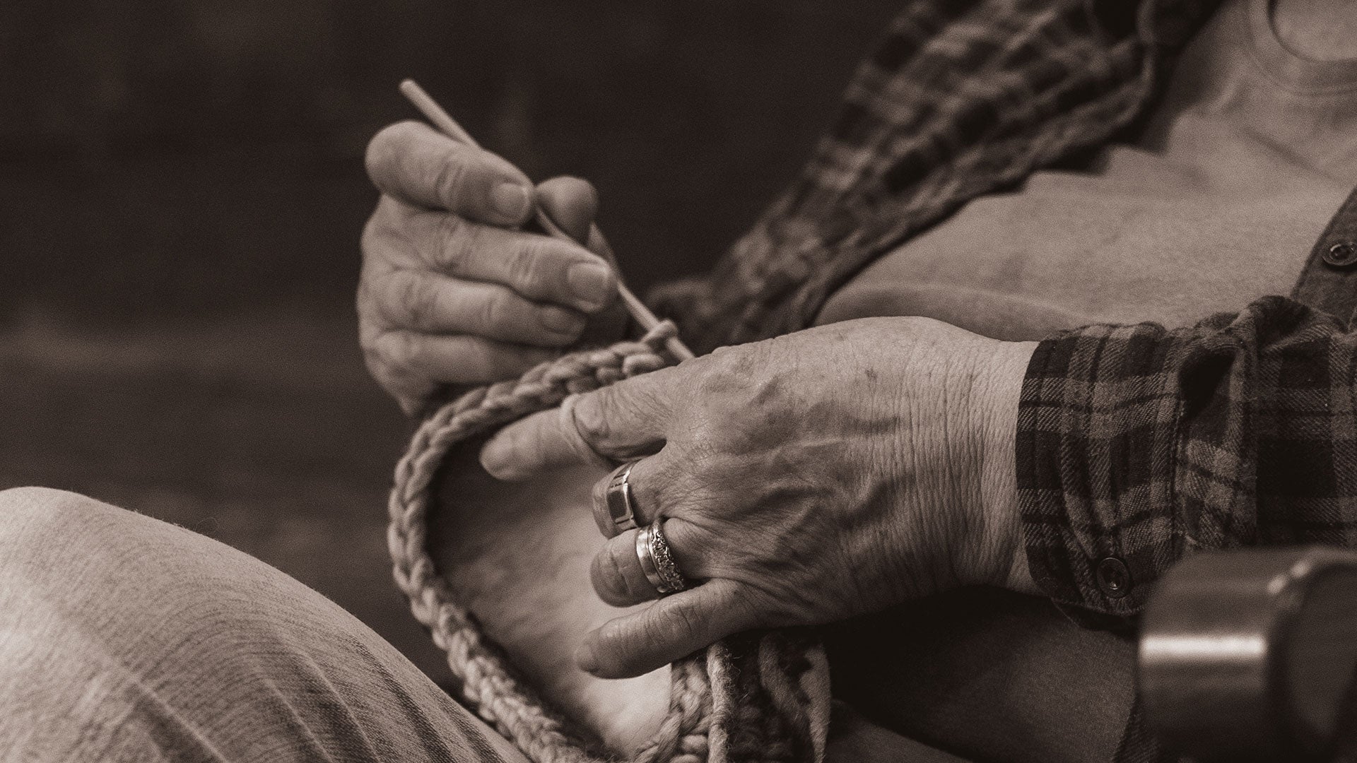 Helen crocheting a Padraig slipper