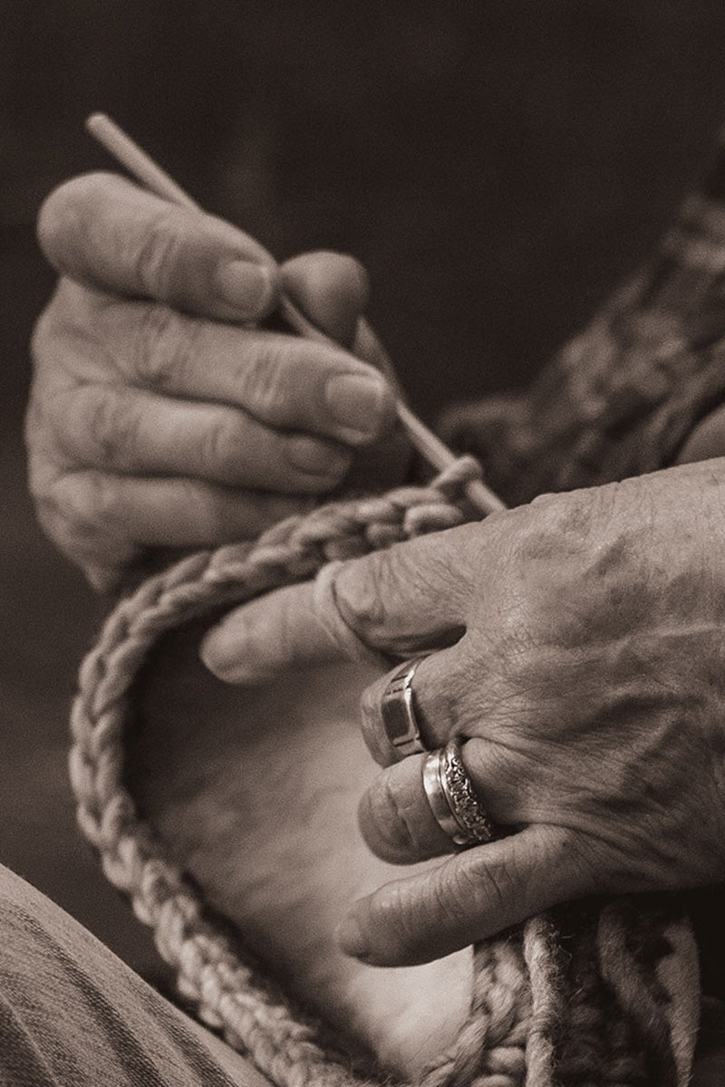 Helen crocheting a Padraig slipper